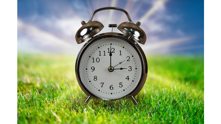 Daylight saving time concept with Alarm clock.