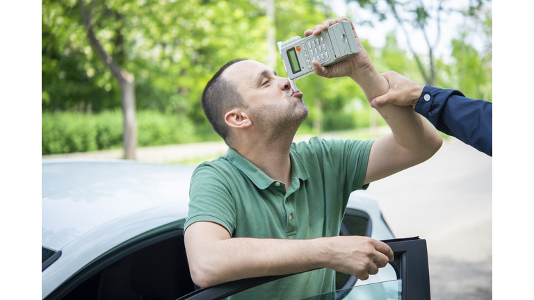 Driver due to being subject to test for alcohol content with use of breathalyzer