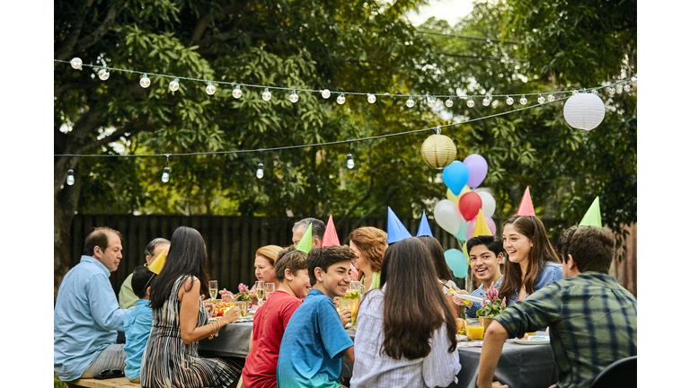 Multi-generation family celebrating birthday party