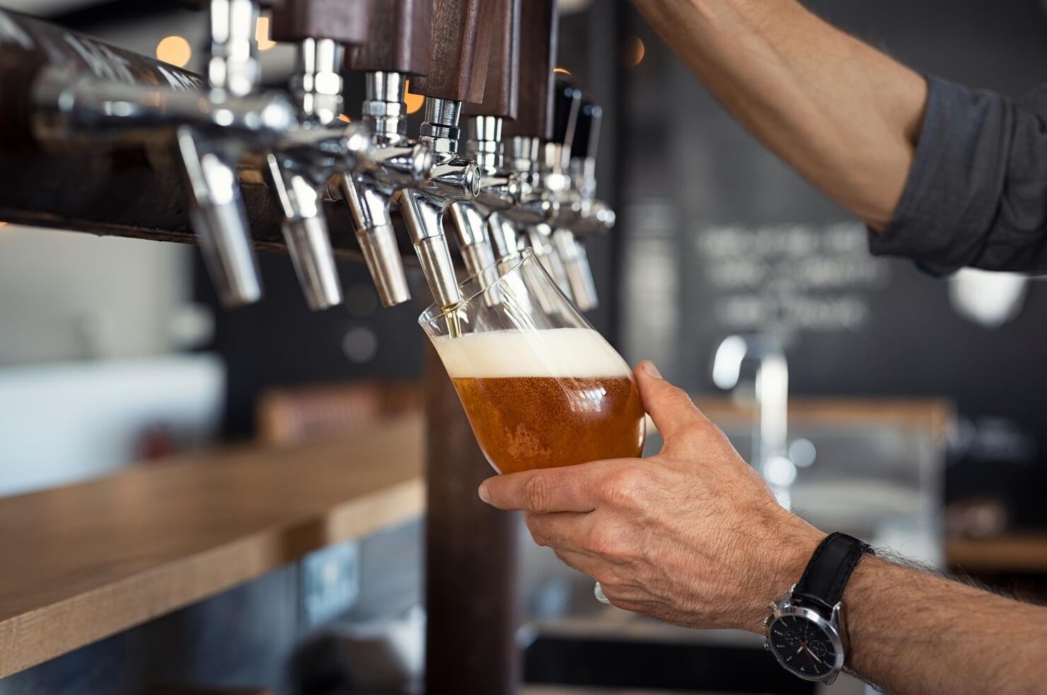 Pouring beer in glass