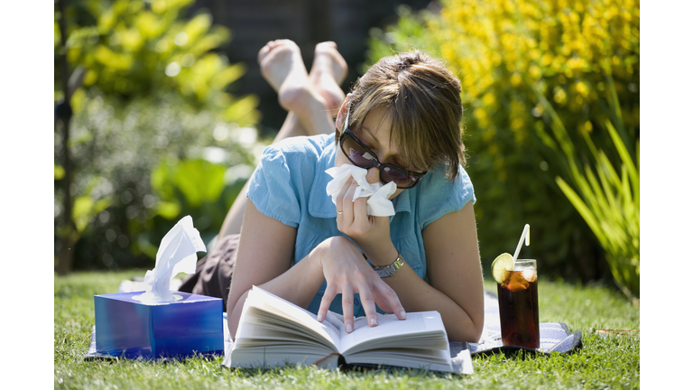 Woman Blowing Her Nose