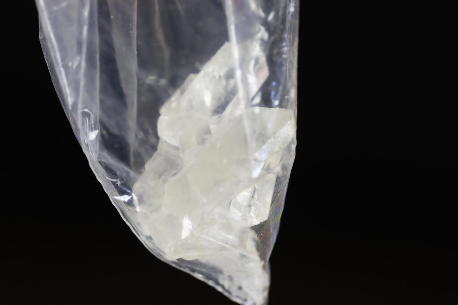 Crystalized illegal drugs in a clear bag