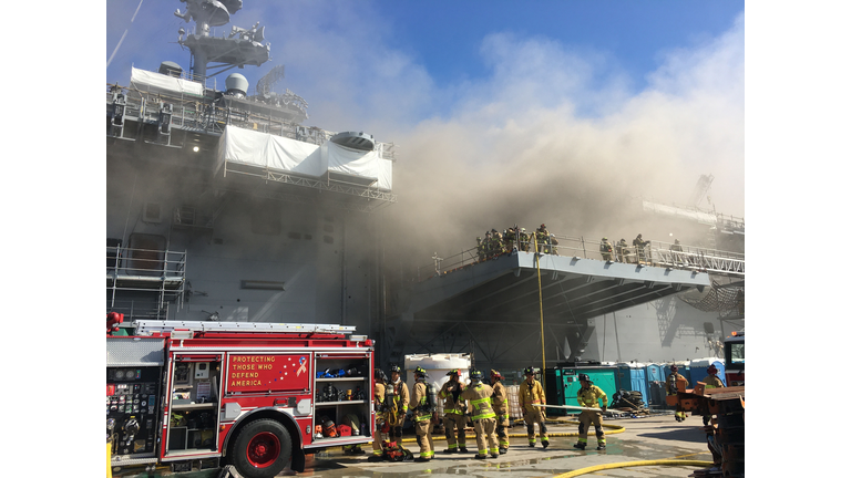 Navy Ship USS Bonhomme Richard Burns At Naval Base In San Diego