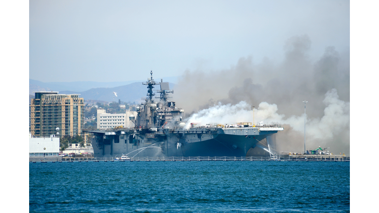 Navy Ship USS Bonhomme Richard Burns At Naval Base In San Diego