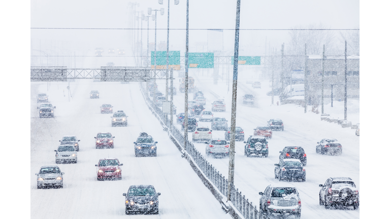 Snowstorm on the Highway during Rush Hour