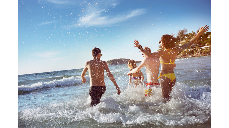 Happy friends sea beach holidays