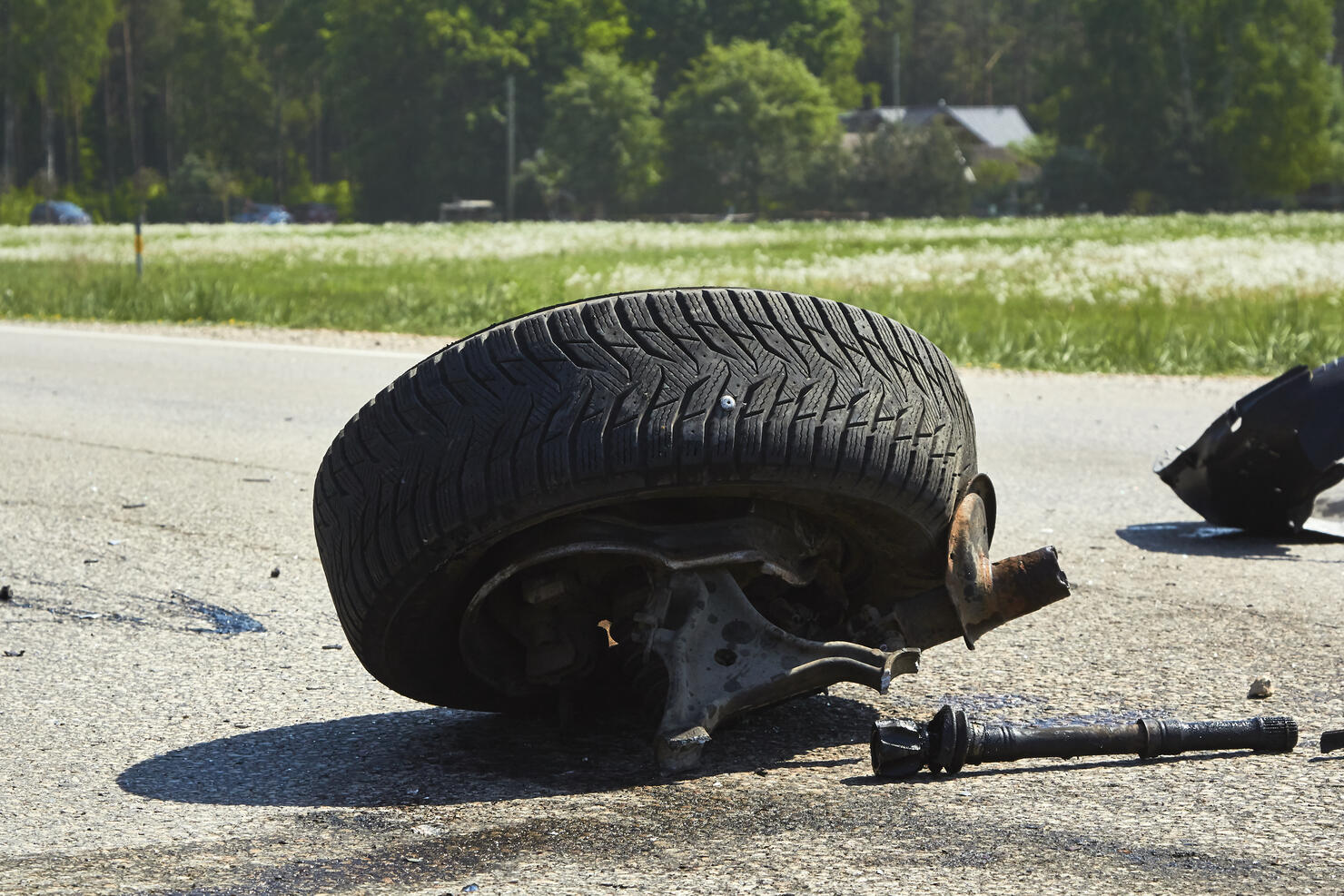 Parts of car after accident on a road