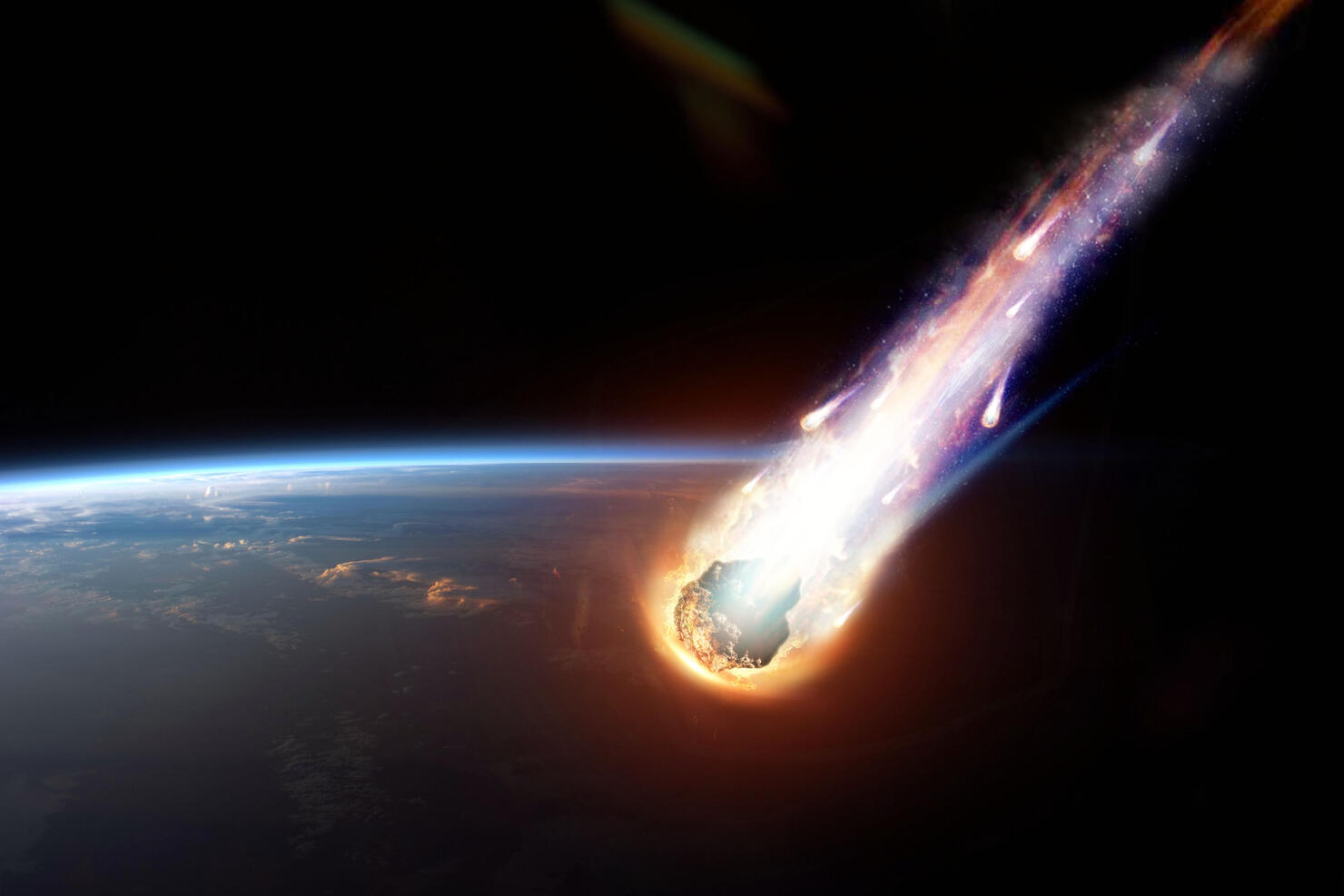 A comet, an asteroid, a meteorite glows, enters the earth's atmosphere. Attack of the meteorite. Meteor Rain. Kameta tail. End of the world. Elements of this image furnished by NASA. Mixed media.