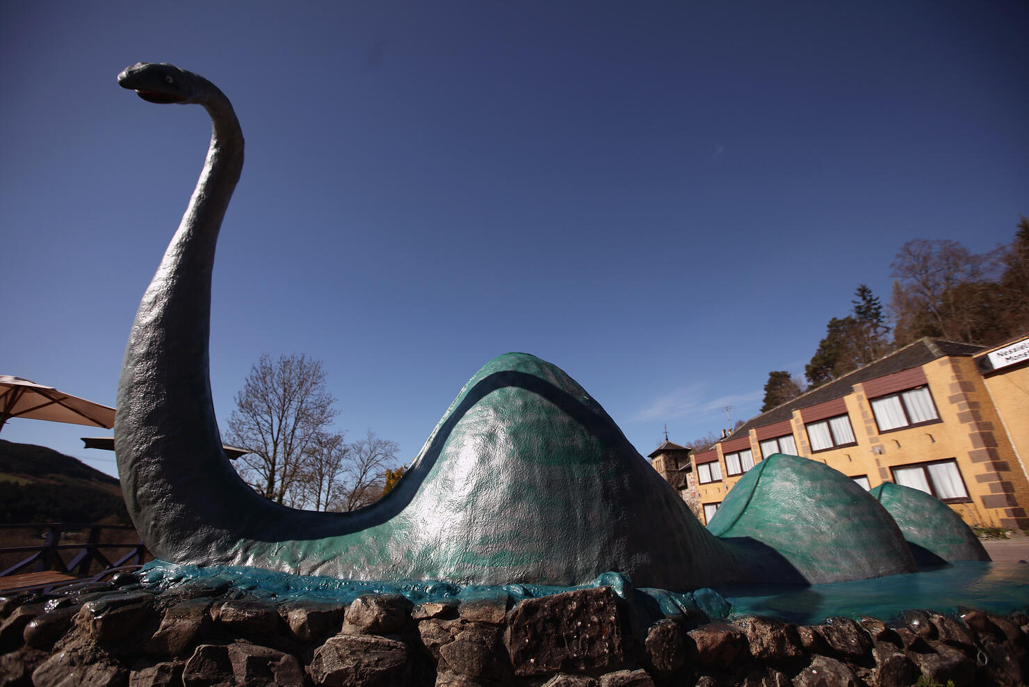Visitors Take In The Ruins Surrounding Loch Ness