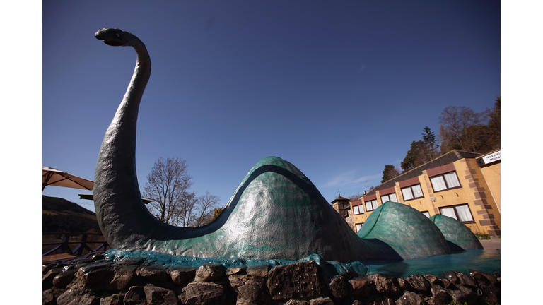 Visitors Take In The Ruins Surrounding Loch Ness