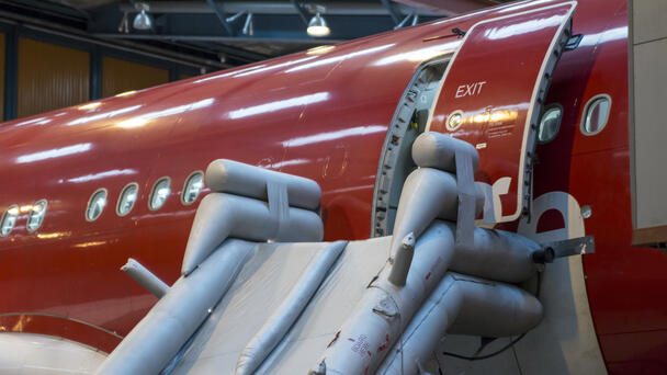 Flight Attendant Accidentally Deployed Emergency Slide, Causing Major Delay