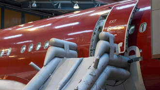 National News - Flight Attendant Accidentally Deployed Emergency Slide, Causing Major Delay