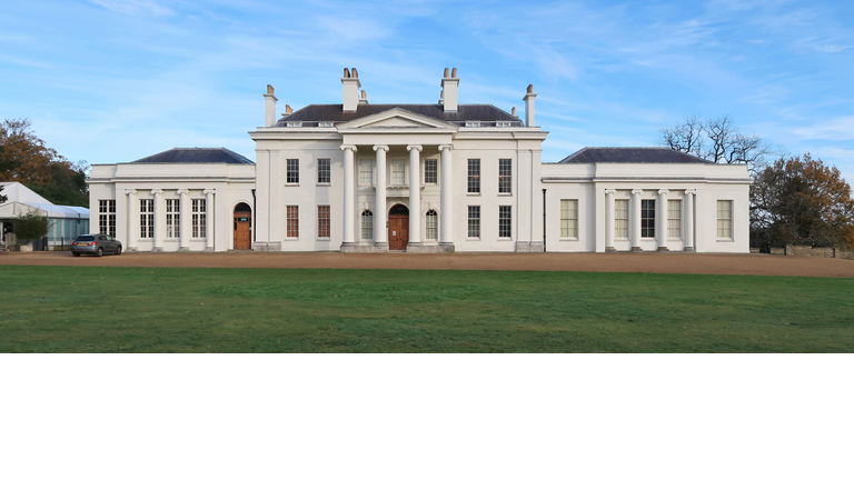 Public Hylands park with Georgian or Regency period mansion house or villa