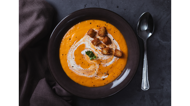 Carrot soup with cream and croutons