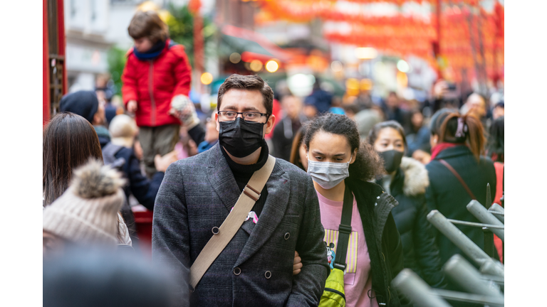 People wearing a face masks to protecting themself because of epidemic in China. Selective Focus. Concept of coronavirus quarantine.