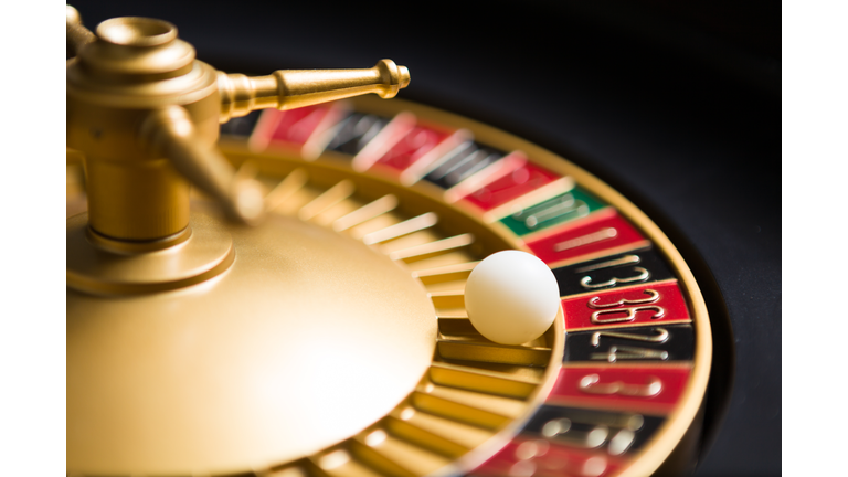 casino roulette wheel with the ball on number 36
