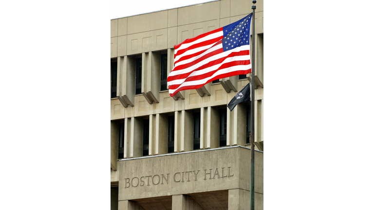 The American flag waves in front of Bost