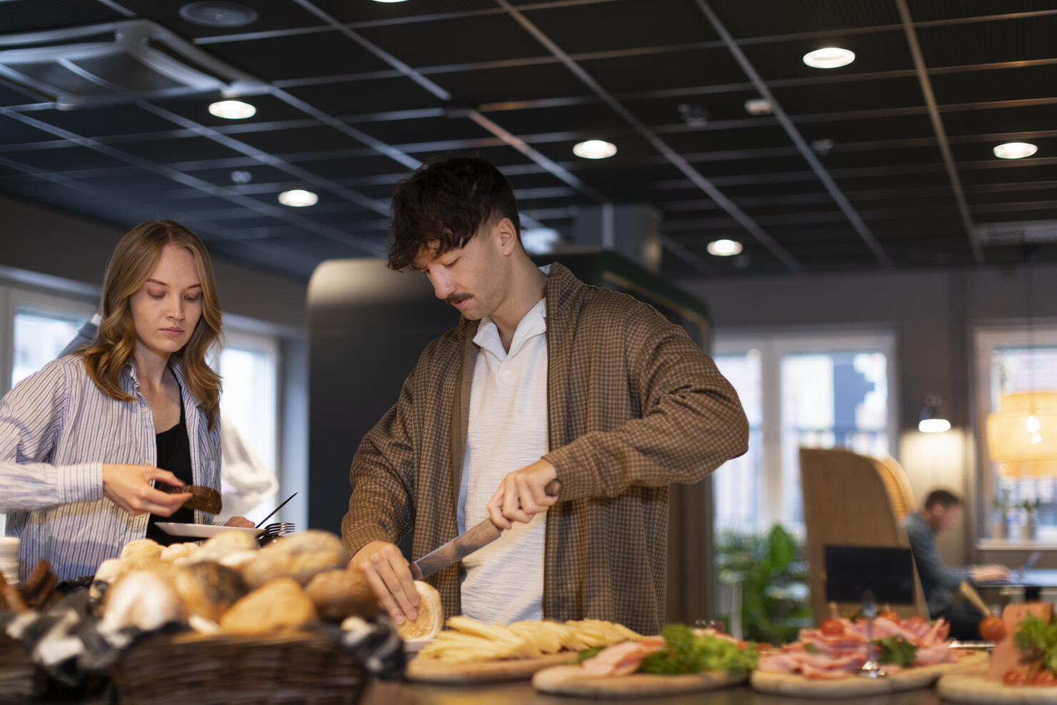 People choosing food in buffet