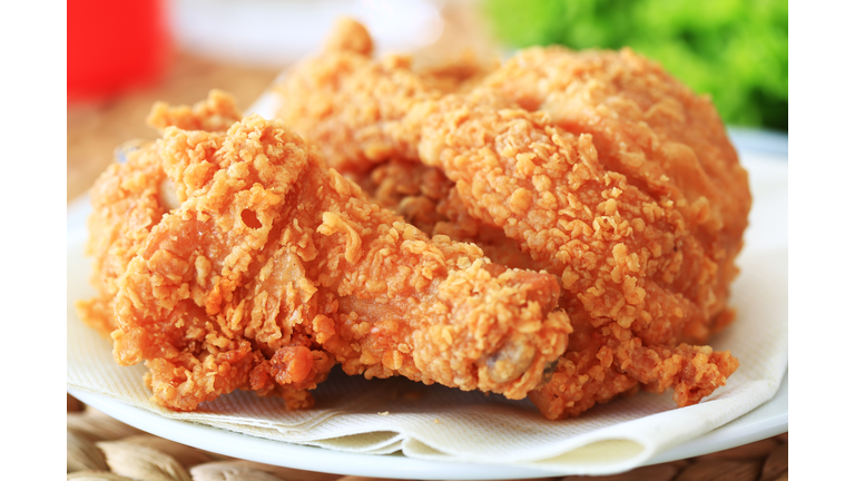 Close-up photo of fried chicken on white plate