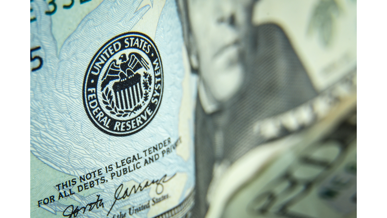 Twenty dollars bills - close up and reflection of US paper money