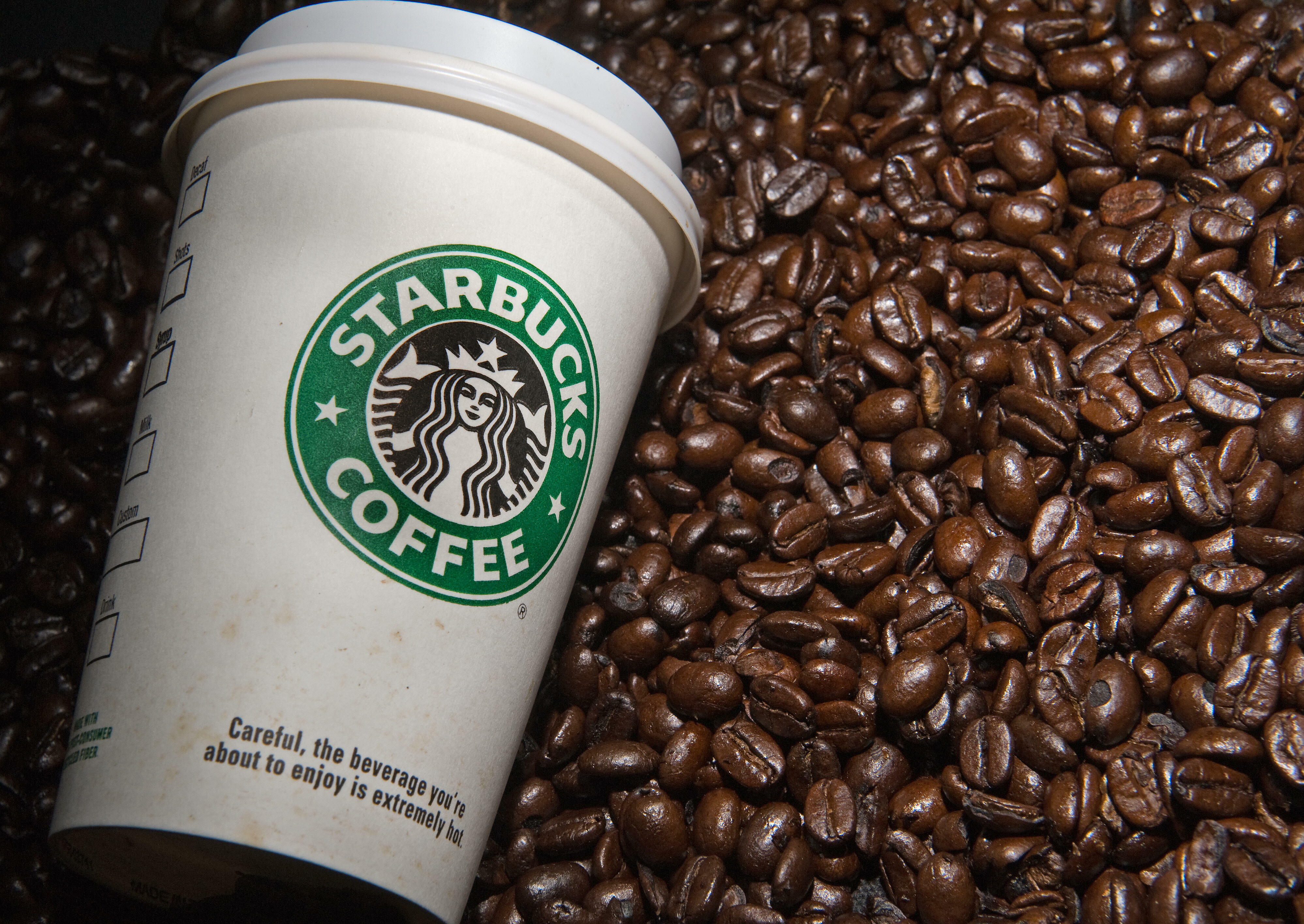 Кофейные фирмы. "Starbucks" кофе "oleato". Кофе фирма Старбакс. Старбакс кафе. Старбакс кофе кофейня.