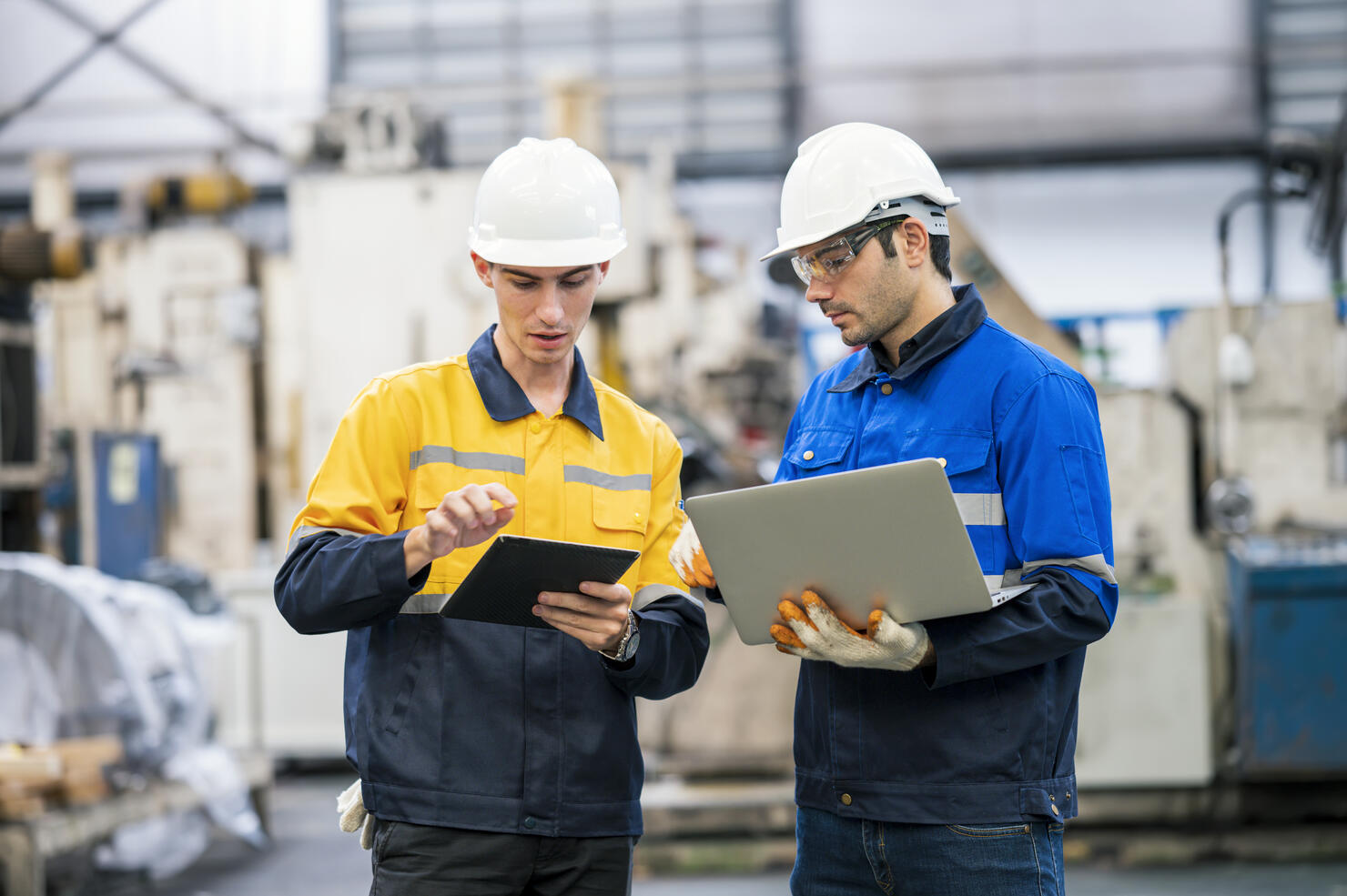 Production Planning Control Engineers are having discussion or follow up about chassis part production progress in automobile industry. They are expert in production planning control activities to improve runtime while maintaining high quality, timely del