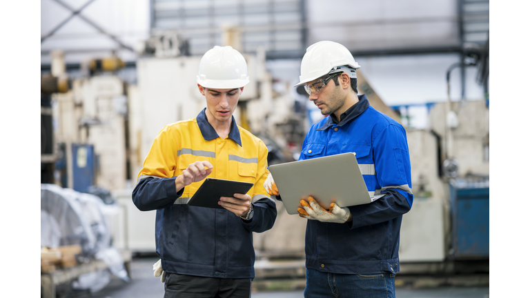 Production Planning Control Engineers are having discussion or follow up about chassis part production progress in automobile industry. They are expert in production planning control activities to improve runtime while maintaining high quality, timely del