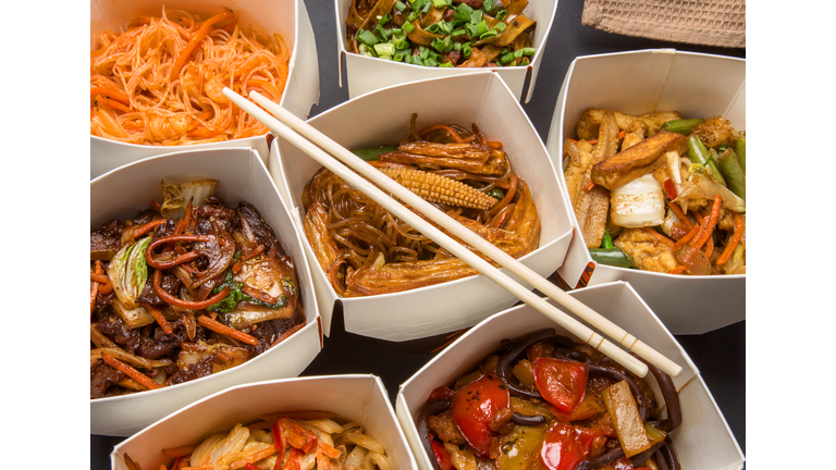 Chinese food in different cardboard boxes