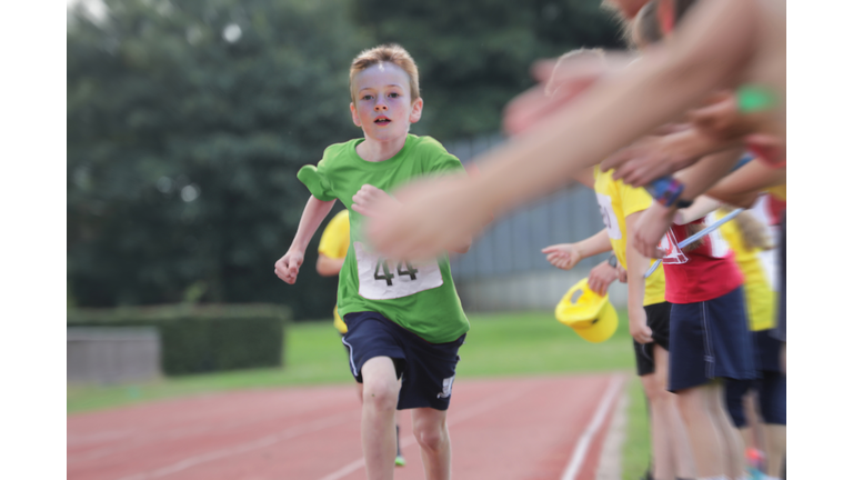Boy running race