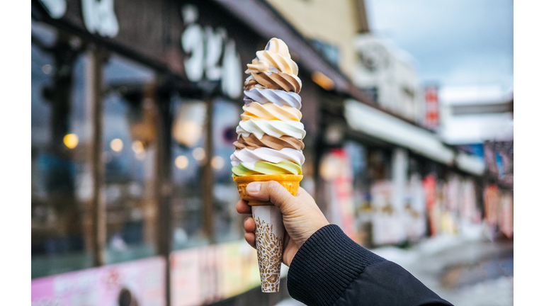 Cropped Hand Holding Ice Cream Cone