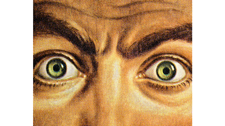 Close Up of Wide Eyed Man