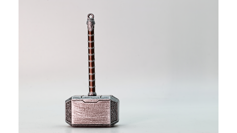 Hammer of Thor, Mjolnir, isolated on white background. The mythical Thors hammer.