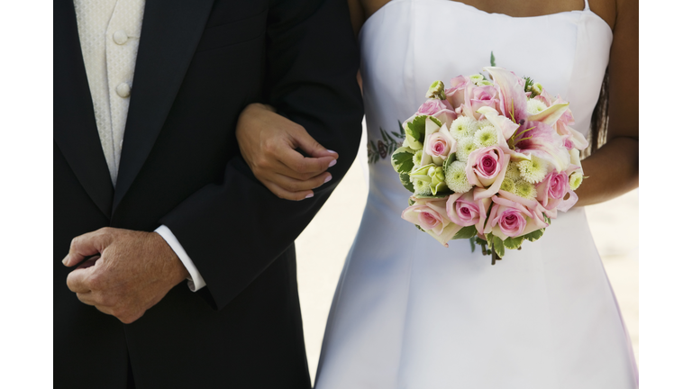 Bride Standing  With Father