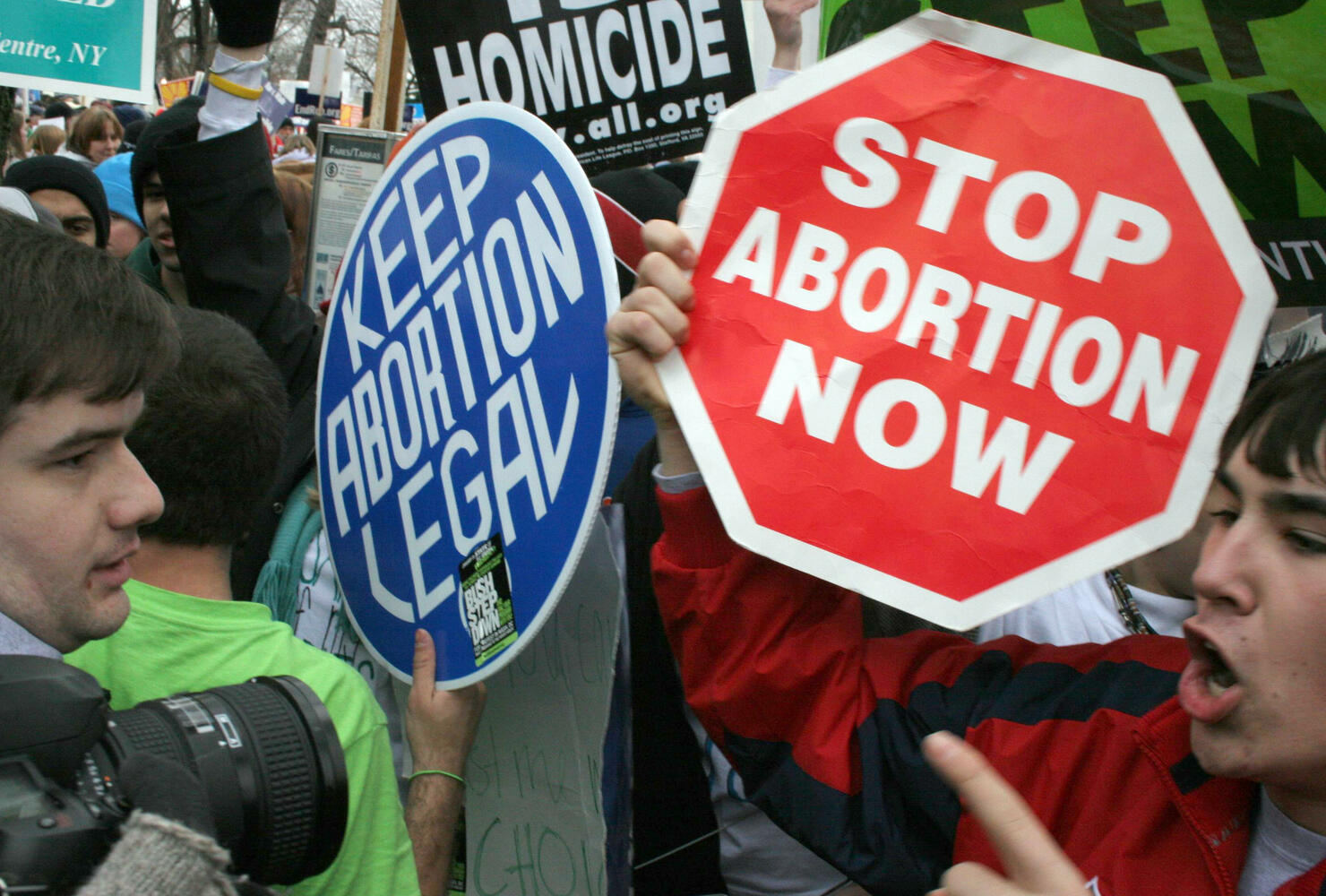 Pro-life demonstrators (R) confront pro-