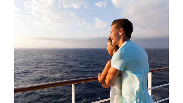 couple enjoying sea view in the morning