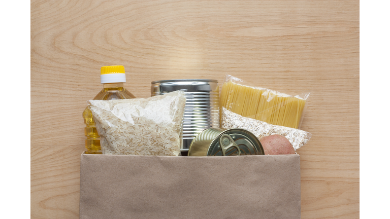 Set of grocery items in paper bag