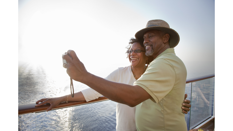 Couple on deck taking picture