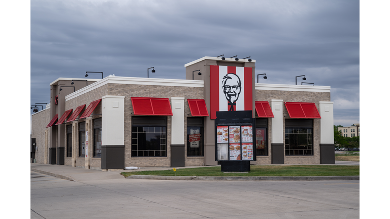 Sign and spinning bucket for a KFC (Kentucky Fried Chicken) fast food restaurant