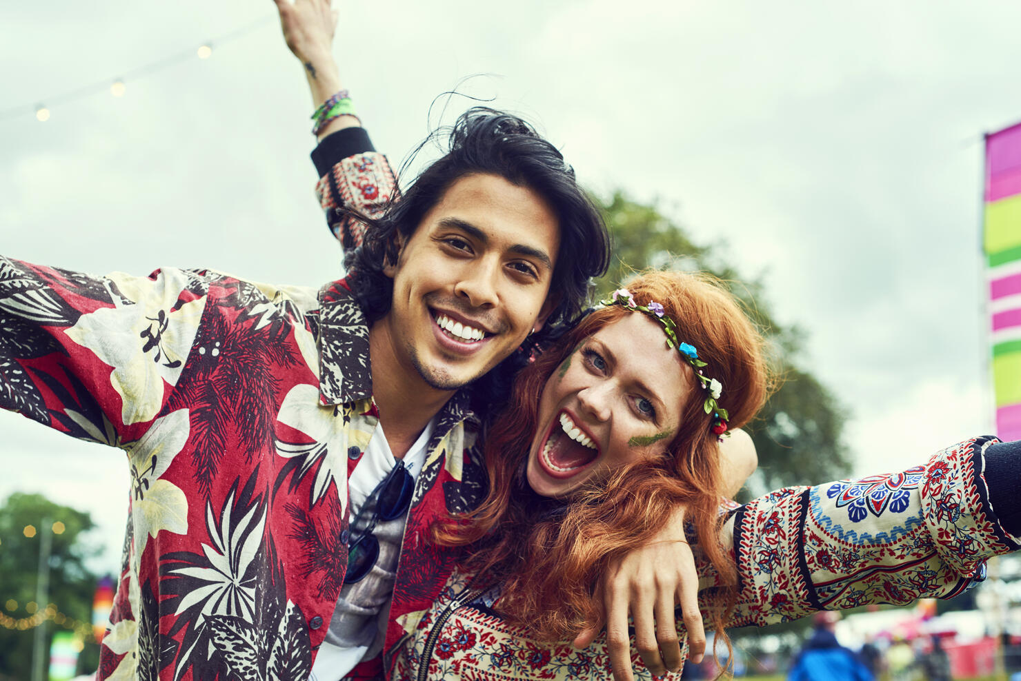 Group of friends having fun at a music festival