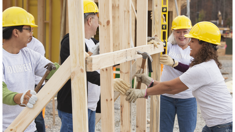 Volunteers working on construction site