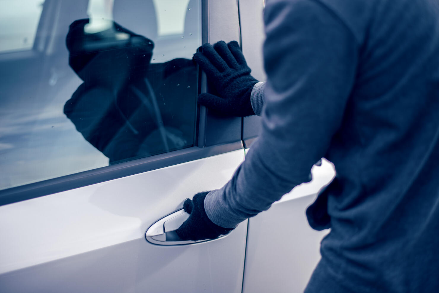 Man stealing a car