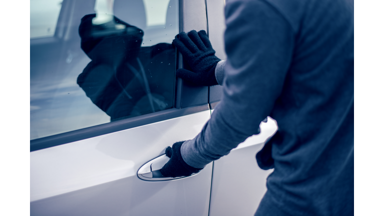 Man stealing a car