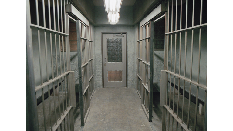 Row of empty prison cells