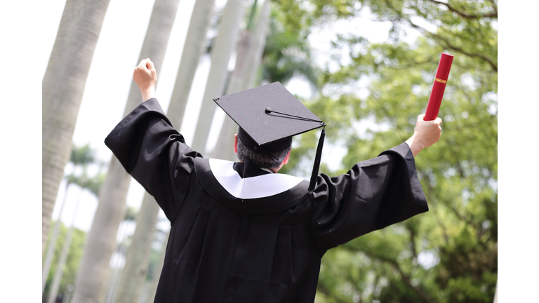 Carefree Senior happy graduates student