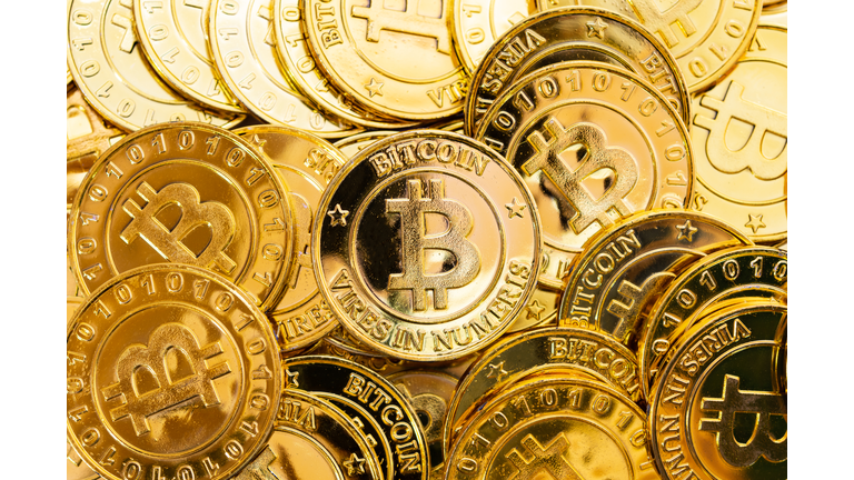 Bitcoin cryptocurrency background. A bunch of golden bitcoin, Digital currency