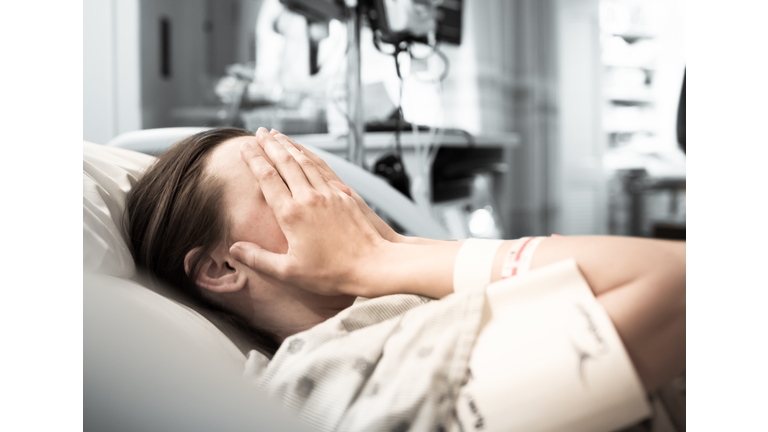 Stressed young woman patient at the hospital