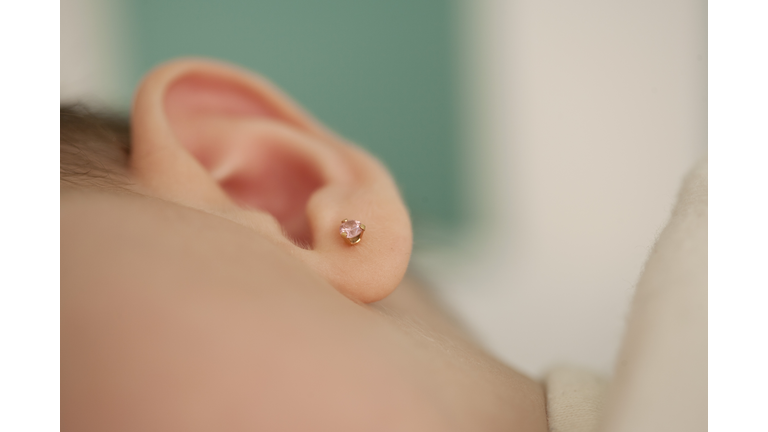 Close-up of baby's ear, cropped