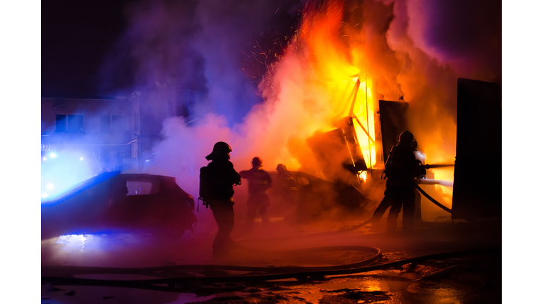 Firefighters fighting fire