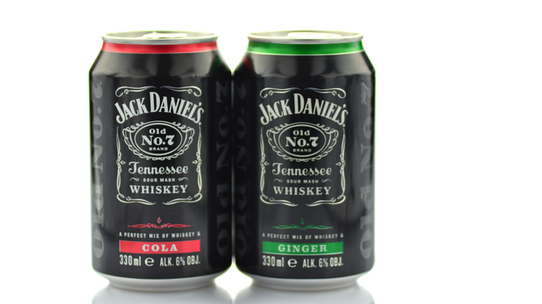 Mix of Jack Daniels whiskey in cans isolated on white