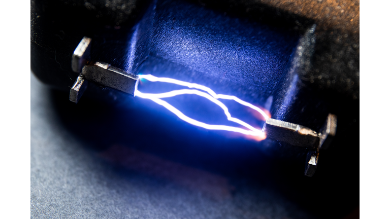 Close up of a stun gun electrons firing